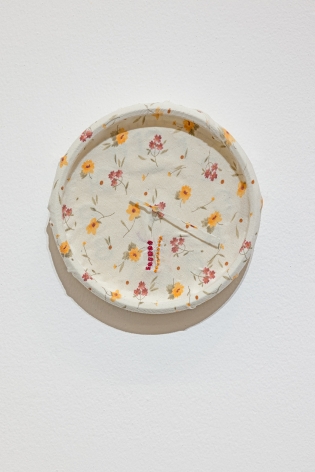 Majd Abdel Hamid, When time stopped (6:10), 2021, Clock, cotton thread on night gown, 25 cm (Diameter)